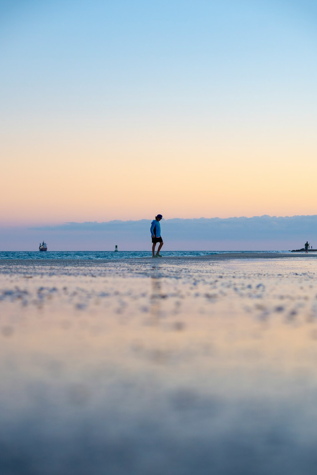 person walking in nature reflecting